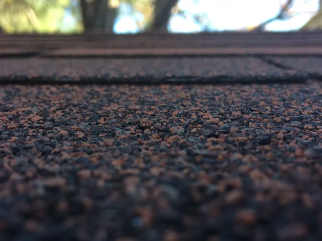 Close-up of architectural asphalt shingle texture
